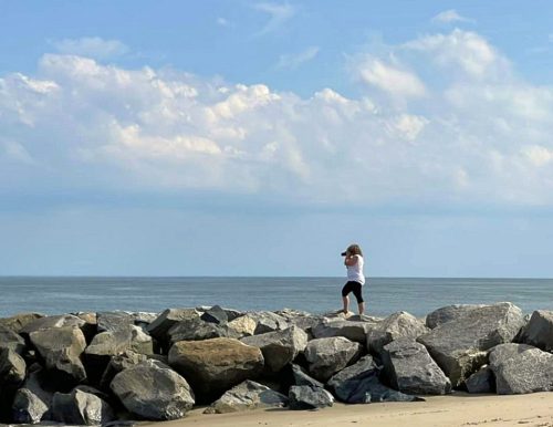 Kim catches a few snapshots from a jetty at Cape Henlopen, Delaware. Photo: Lori Toia