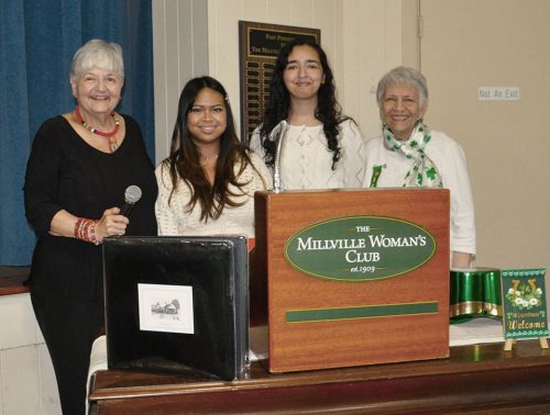 From left: MWC Donna Pio, Chair MWC Education Committee; Celia Gisone and Mira Navalta, MHS seniors; Barbara Westog, MWC Education Committee.