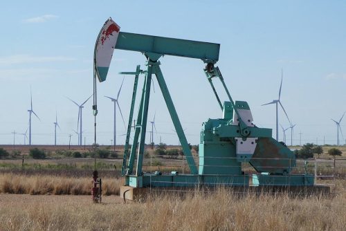 Oil wells dot the Texas landscape, in contrast to clean energy. Photo: Larry Syverson