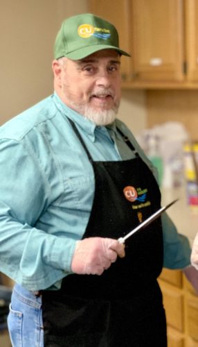 Roger Asselta preparing chili for the Annual Chili Bowl. CU File Photo