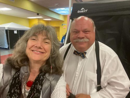 A producer, Sue Wolf, poses with Kevin Chamberlain, who plays Buddy Bob Morgan, the father of the bride.